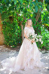 long sleeve tiered skirt wedding dress